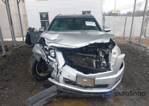 2014 Cadillac Srx Luxury Collection z USA, uszkodzony, nr VIN 3GYFNBE39ES686351